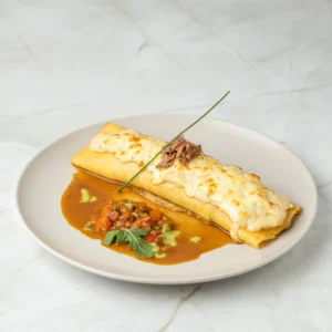 Canelón de carrillera en salsa